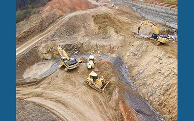 Machines in Dirt Pit Resize